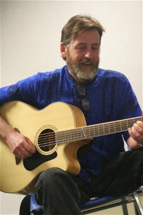 photo of Pat Maloney with guitar